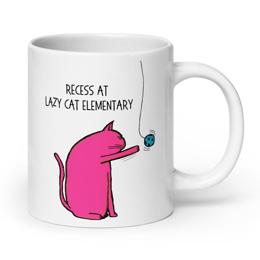 White glossy mug featuring a lazy cat batting at a ball on a string with a humorous design.